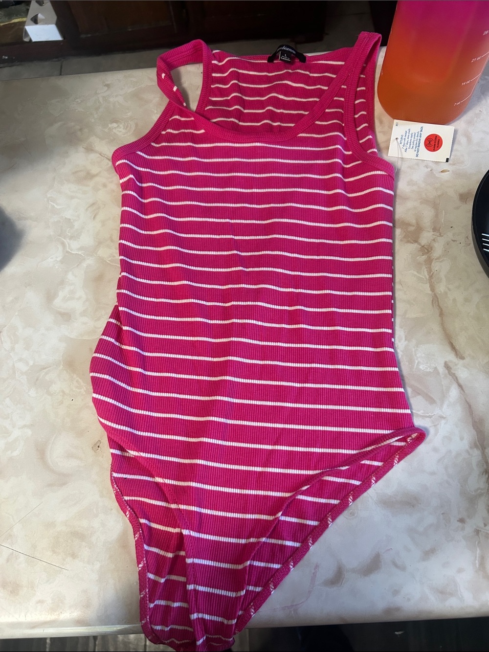 Target Girls' Pink and White Striped Ribbed Tank Bodysuit and it’s very soft